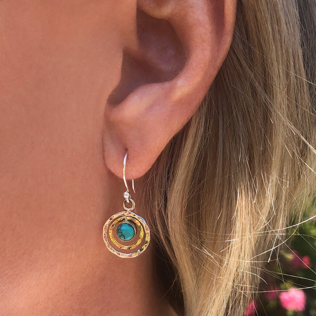 Boucles d'oreilles à découpe circulaire avec pierres précieuses