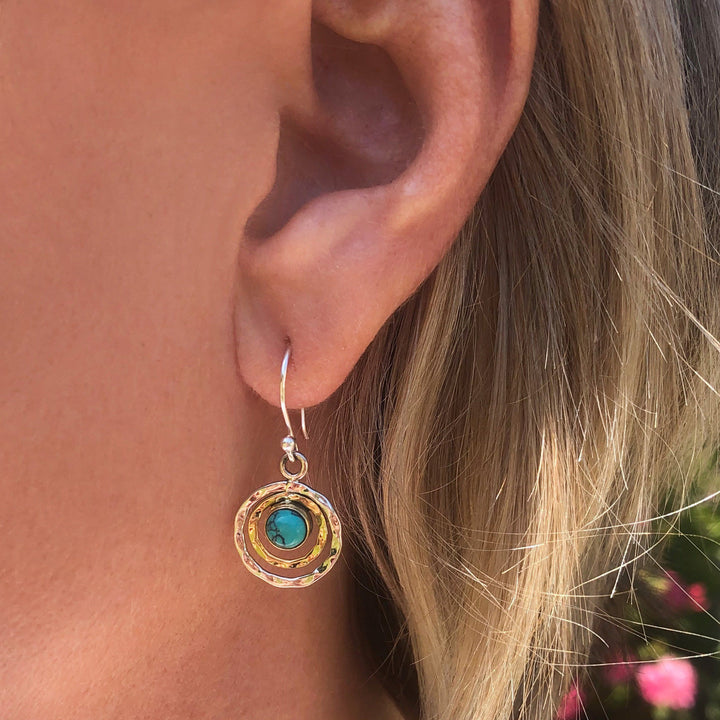 Boucles d'oreilles à découpe circulaire avec pierres précieuses