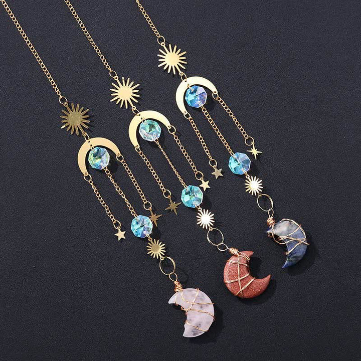 Ornement en cristal fait main avec pierres précieuses en forme de soleil et de lune