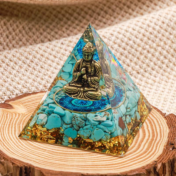 Bouddha Olivenorma avec pyramide orgone d'équilibre turquoise naturelle