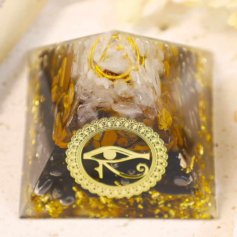Olivenorma La pyramide orgonite en obsidienne et œil de tigre pour la protection énergétique
