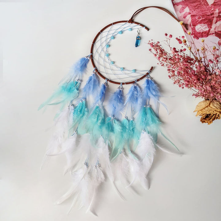 Attrape-rêves pendentif lune avec topaze bleue Olivenorma