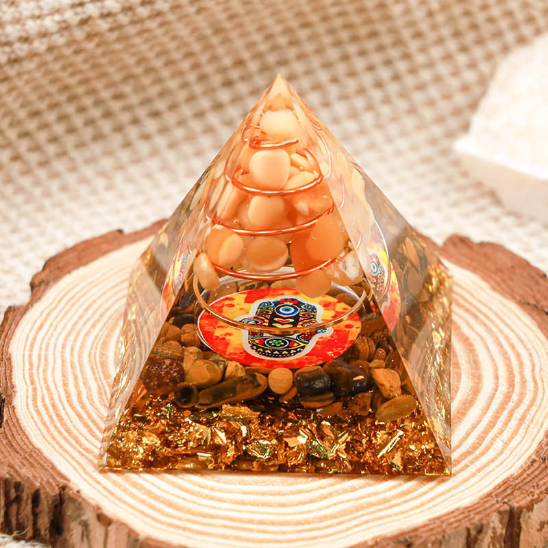 Pierre de soleil Olivenorma avec œil de tigre Pyramide Orgone Hamsa