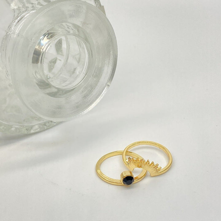 Bague en acier inoxydable plaqué or 18 carats avec tournesol en onyx noir Olivenorma