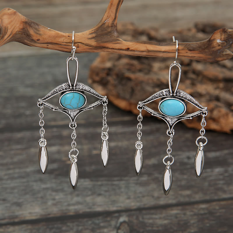 Boucles d'oreilles bohèmes en turquoise avec découpes géométriques Olivenorma