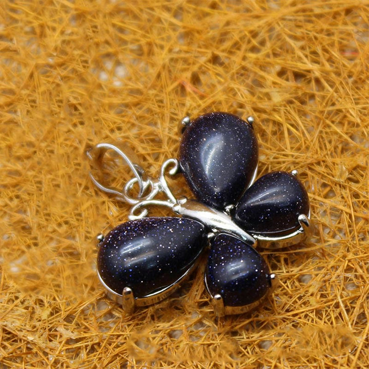 Collier papillon en cristal naturel Olivenorma