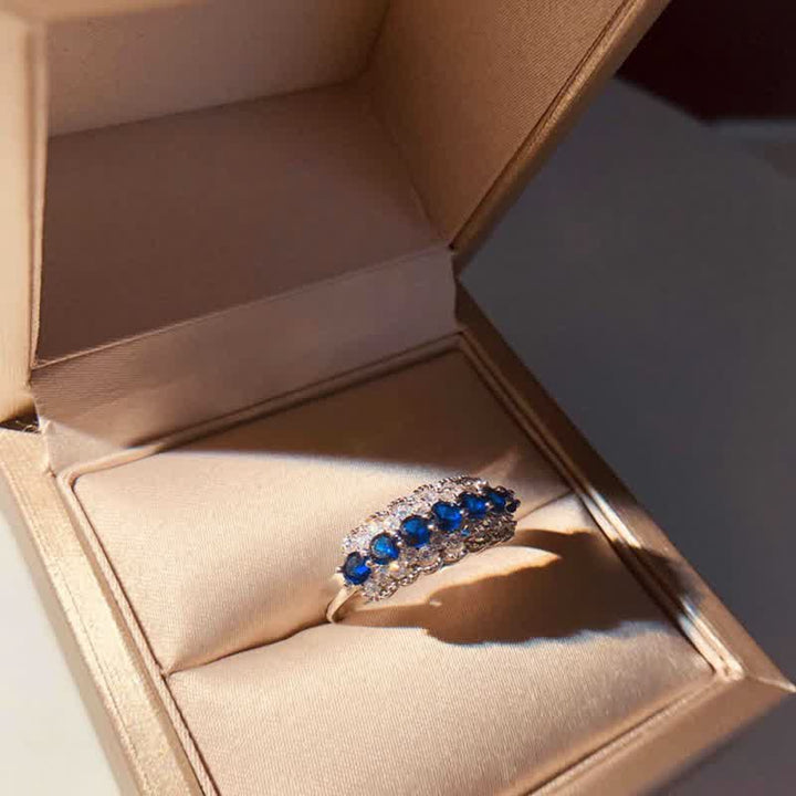 Bague créative en saphir bleu et zircon creux Olivenorma