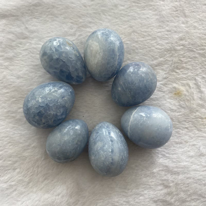 Œuf en cristal bleu aigue-marine poli Olivenorma en forme d'œuf