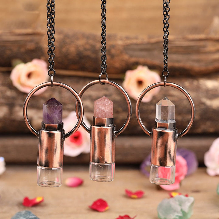 Pendentif bouteille de parfum en cristal naturel prismatique Olivenorma