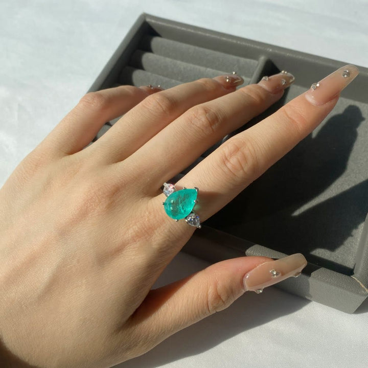 Bague exquise en zircon blanc et tourmaline Paraiba Olivenorma