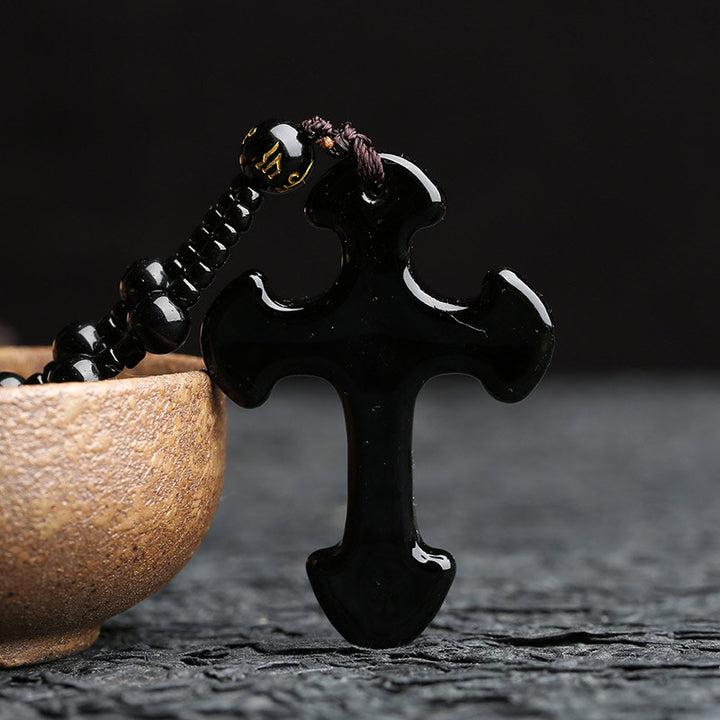Collier symbole de croix en obsidienne Olivenorma