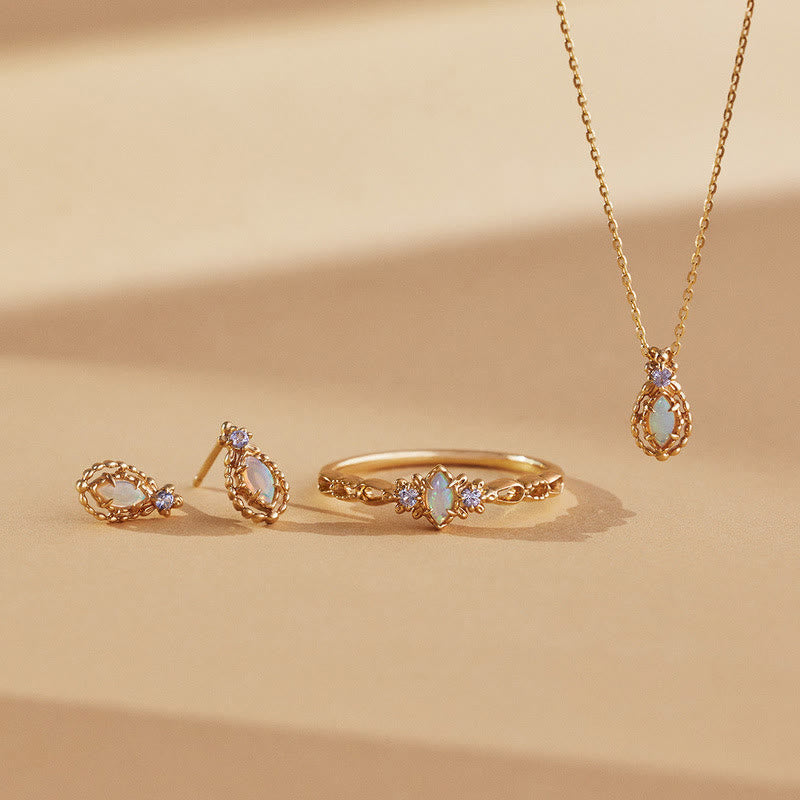 Collier, boucles d'oreilles et bague en dentelle violette naturelle d'opale Olivenorma