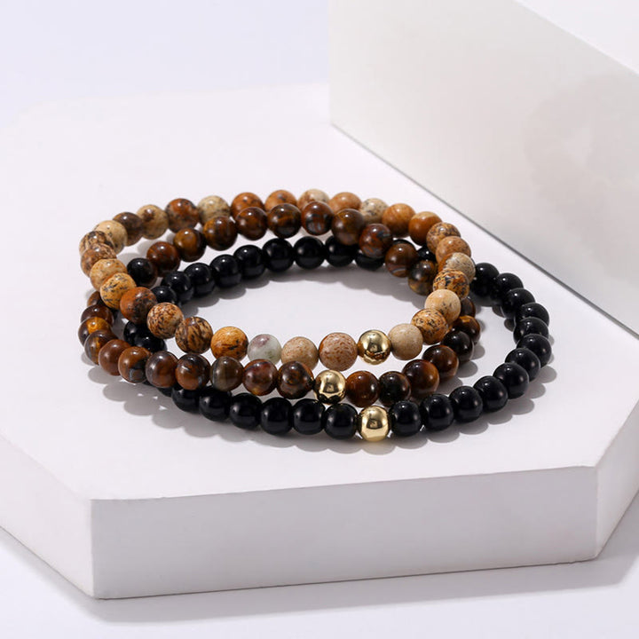 Bracelet Olivenorma en perles de 6 mm en onyx et œil de tigre
