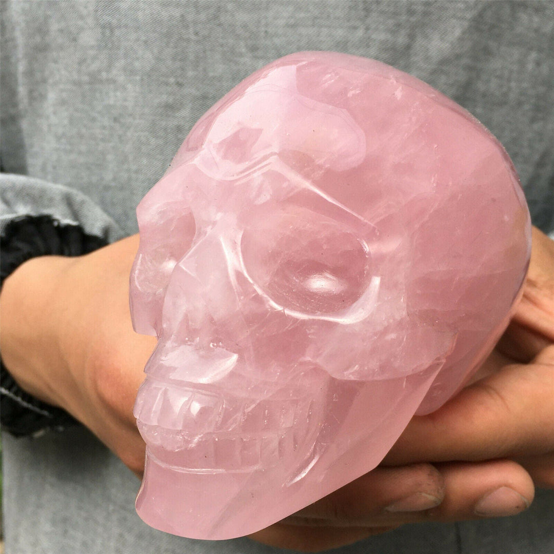Décoration de crâne en cristal de quartz rose naturel Olivenorma