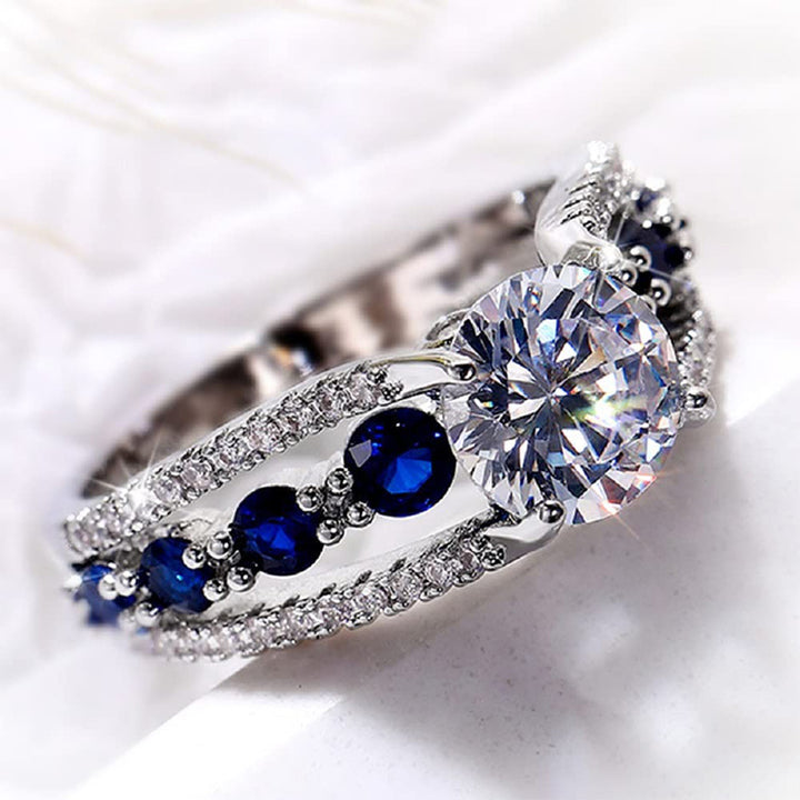 Bague créative en saphir bleu et zircon creux Olivenorma