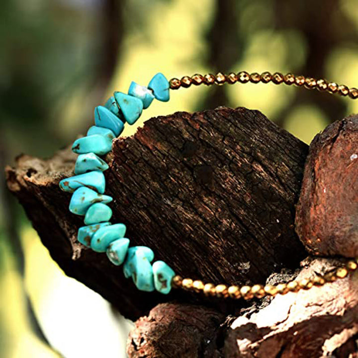 Bracelet en or et perles turquoise Olivenorma