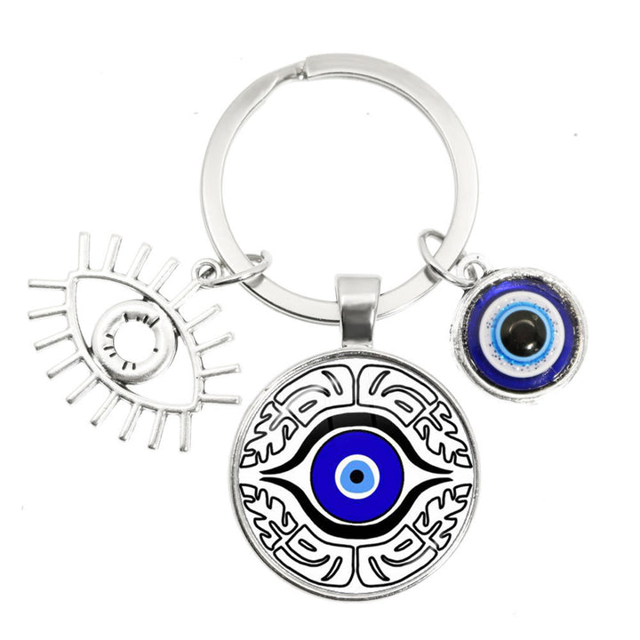 Porte-clés en époxy bleu mauvais œil Hamsa Olivenorma