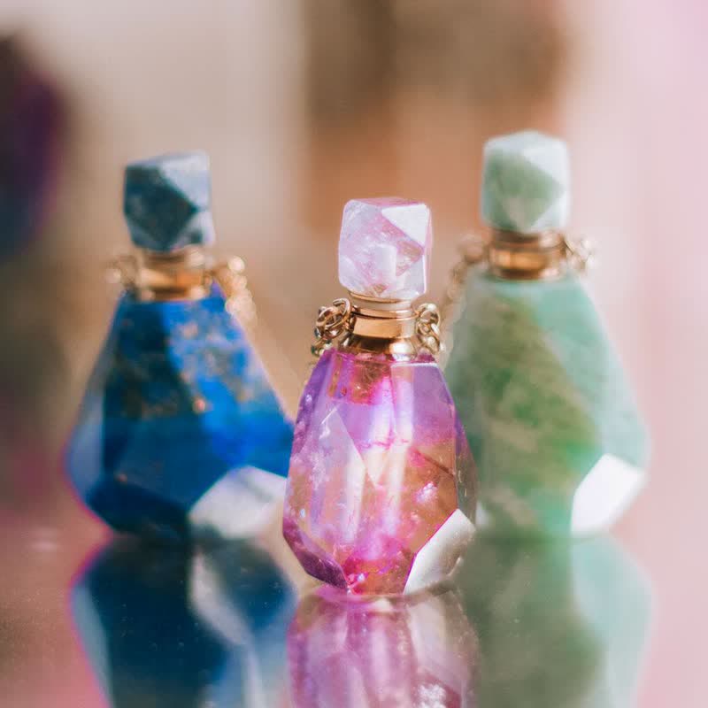 Collier bouteille de parfum en cristal