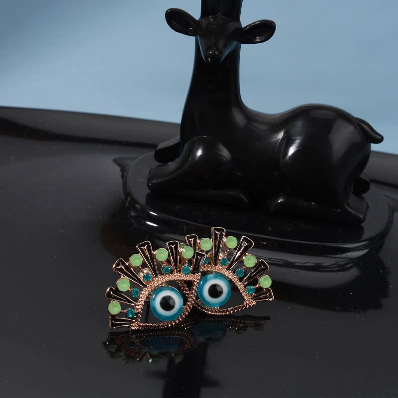 Olivenorma « Eye of Doom » - Boucles d'oreilles paon créatives en saphir
