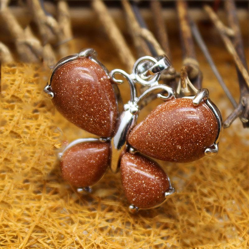 Collier papillon en cristal naturel Olivenorma