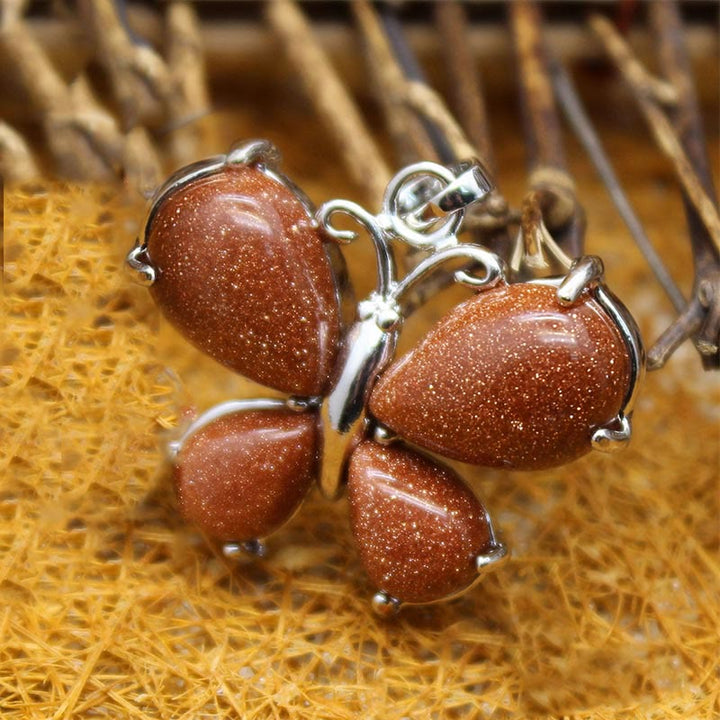 Collier papillon en cristal naturel Olivenorma