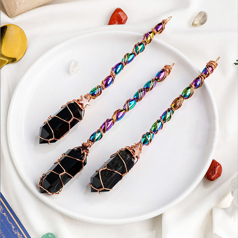 Baguettes magiques en cristal enveloppées en fil d'or d'obsidienne Olivenorma