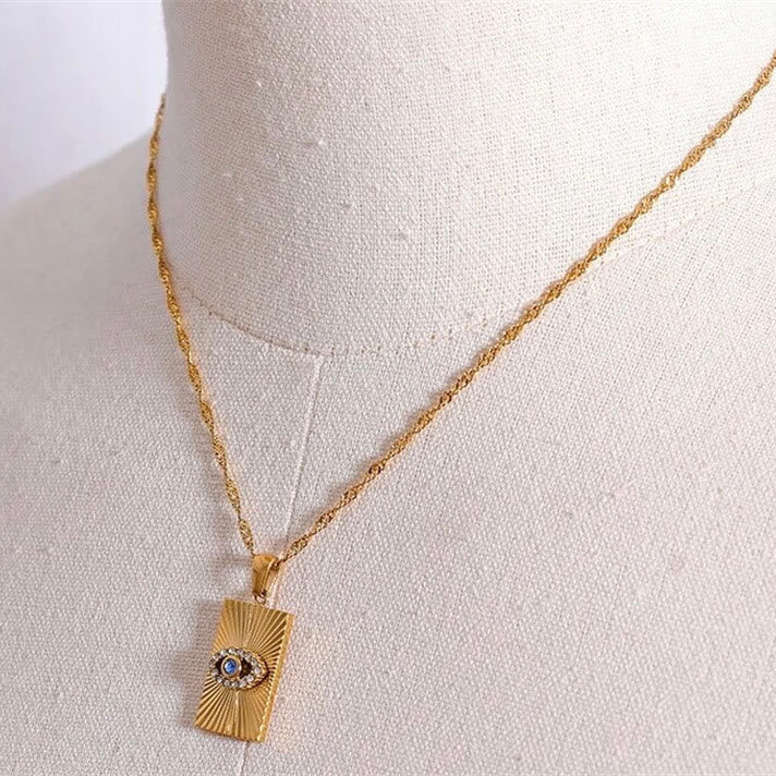 Collier Olivenorma avec topaze bleue et zircon blanc mauvais œil