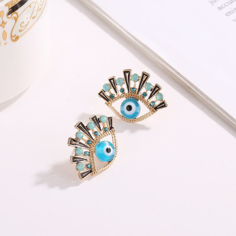 Olivenorma « Eye of Doom » - Boucles d'oreilles paon créatives en saphir