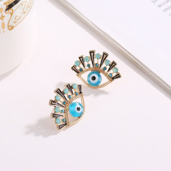 Olivenorma « Eye of Doom » - Boucles d'oreilles paon créatives en saphir