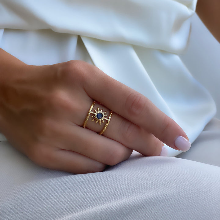 Bague Olivenorma en forme d'étoile à huit branches et à double rangée de tournesols