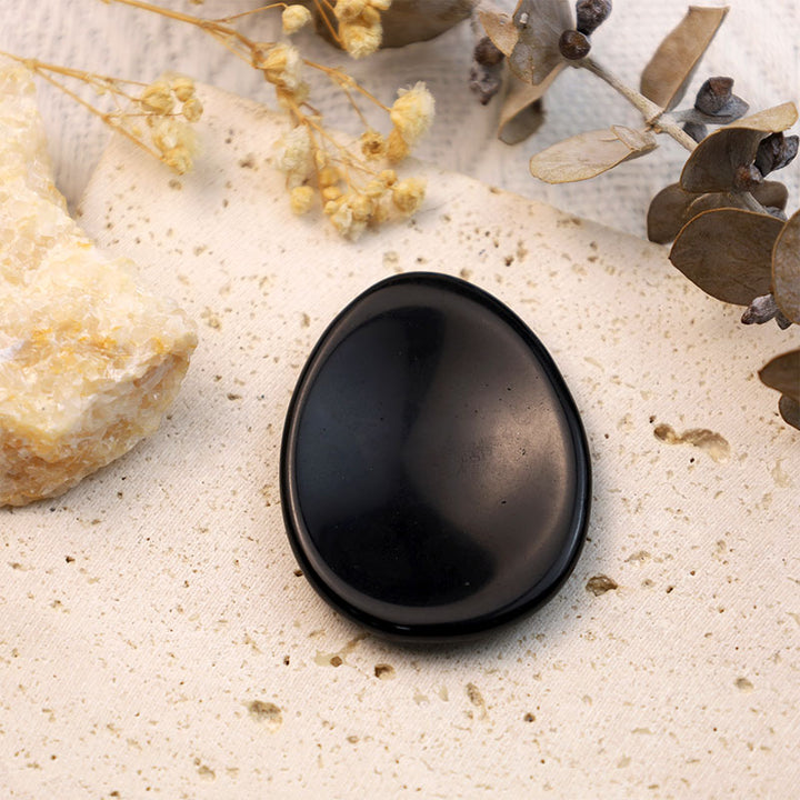 Pierre d'inquiétude pour le pouce en forme d'œuf d'onyx noir Olivenorma