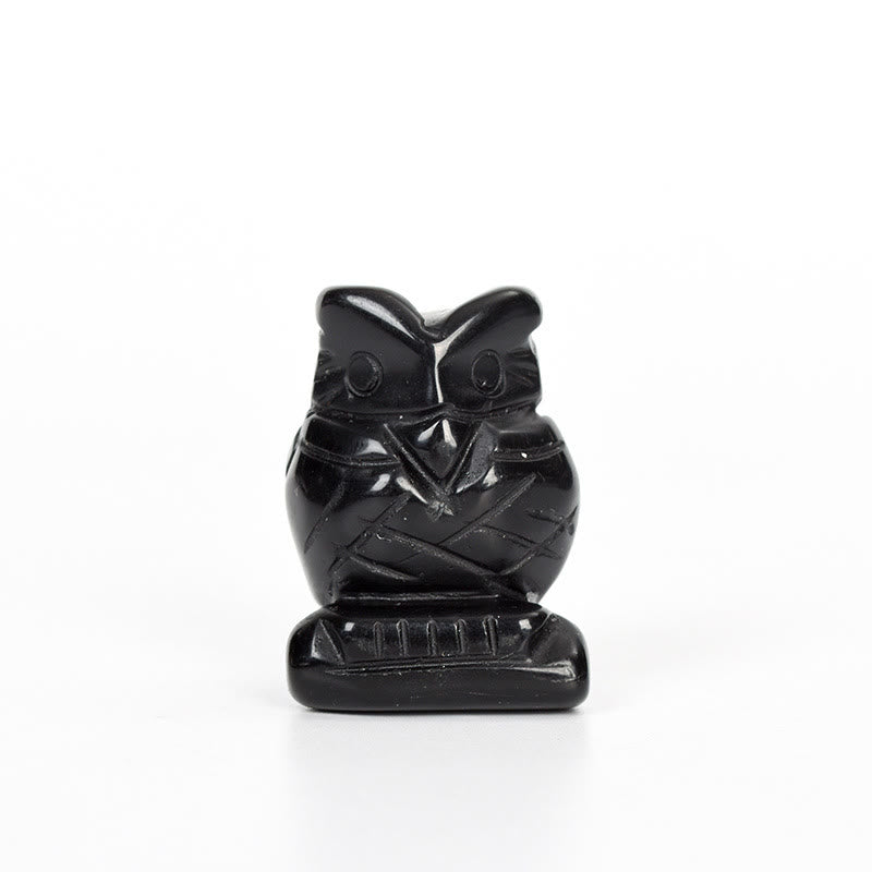 Sculpture artisanale en cristal naturel de hibou Olivenorma