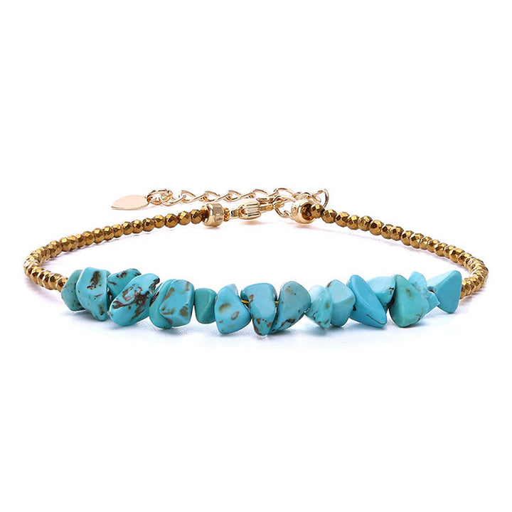 Bracelet en or et perles turquoise Olivenorma