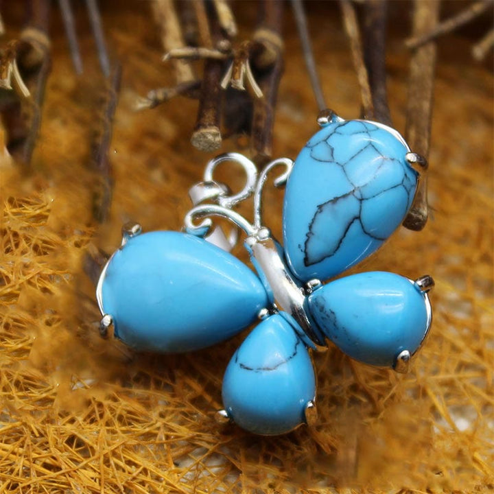 Collier papillon en cristal naturel Olivenorma