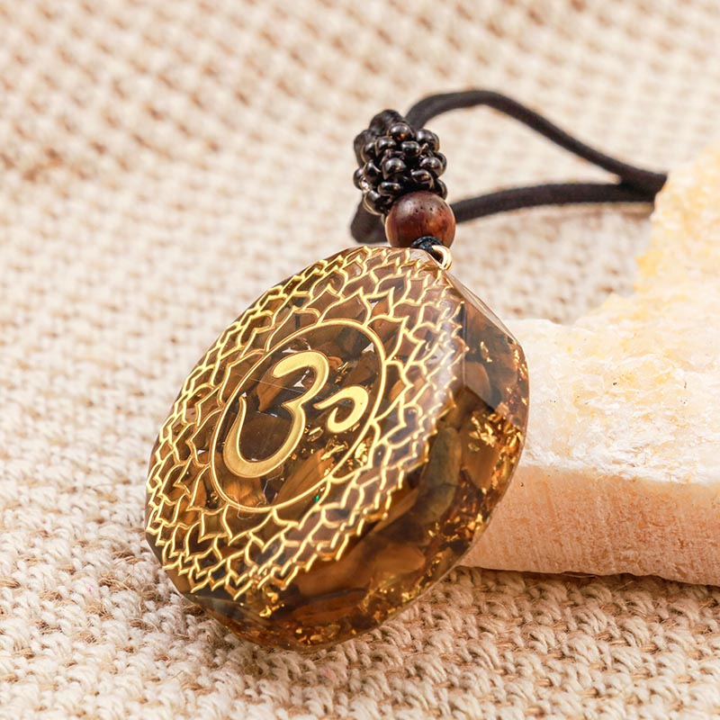 Collier de protection symbole OM œil de tigre Olivenorma