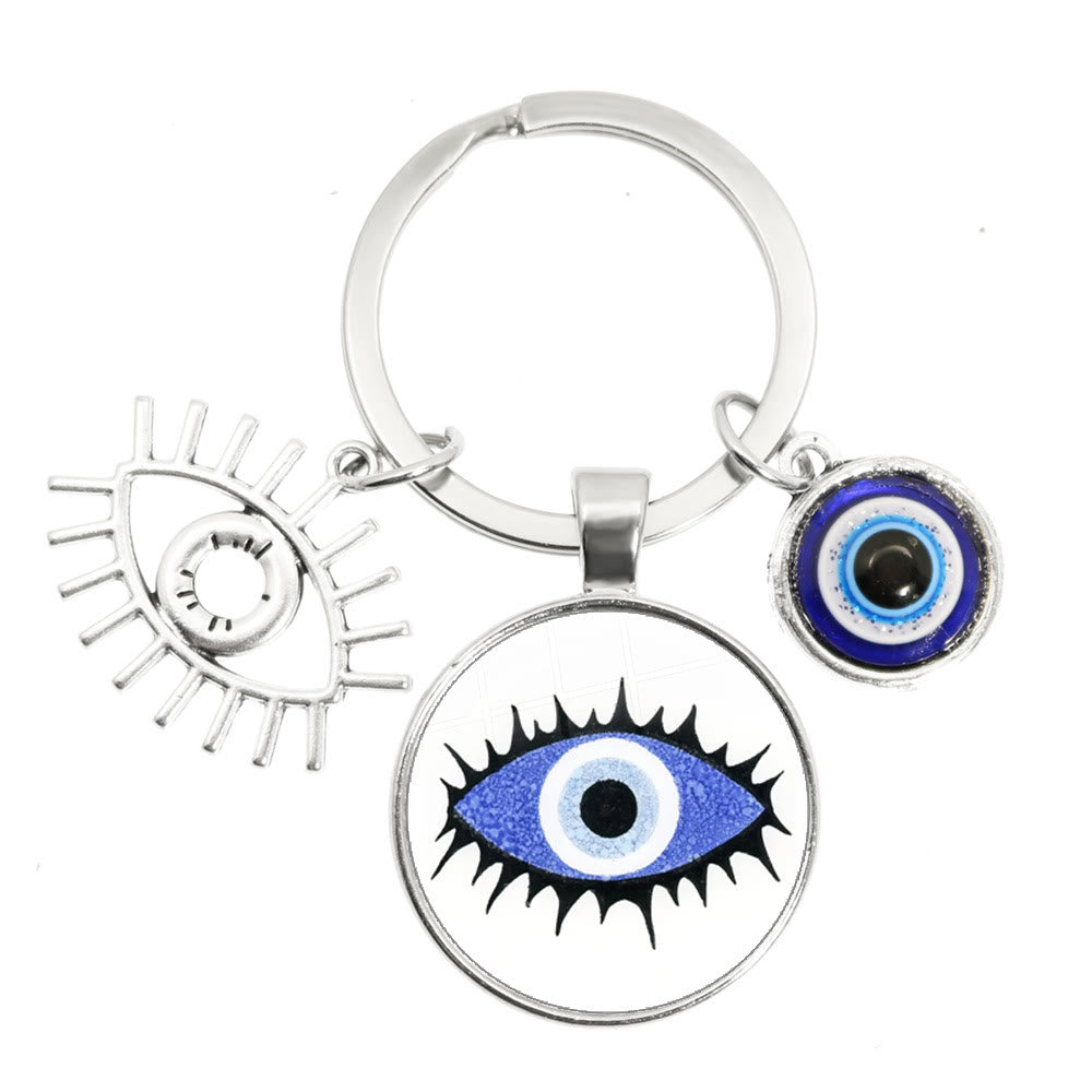 Porte-clés en époxy bleu mauvais œil Hamsa Olivenorma
