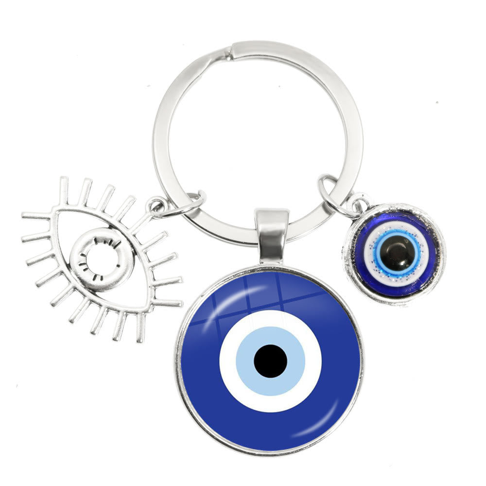 Porte-clés en époxy bleu mauvais œil Hamsa Olivenorma