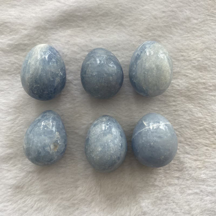 Œuf en cristal bleu aigue-marine poli Olivenorma en forme d'œuf