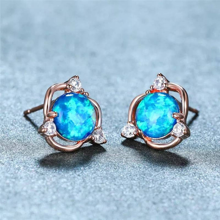 Boucles d'oreilles à tige rondes en zircon blanc et opale Olivenorma
