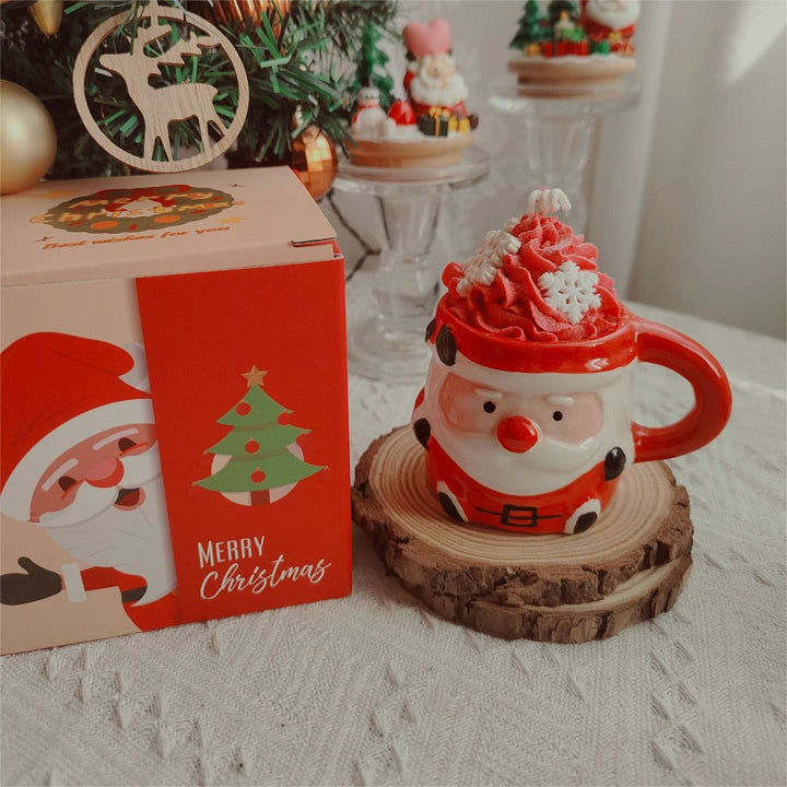 Bougie de Noël en forme de tasse de Père Noël, bonhomme de neige et élan Olivenorma