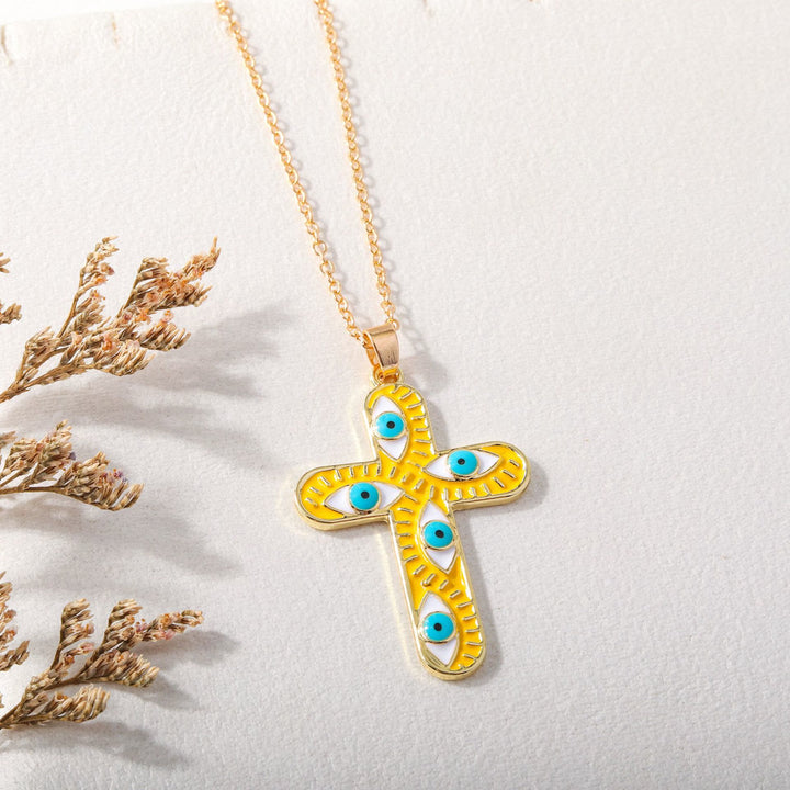 Collier Croix Mauvais Œil Olivenorma « Nous sommes protégés »