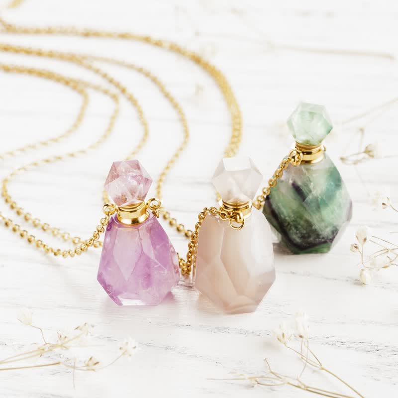 Collier bouteille de parfum en cristal