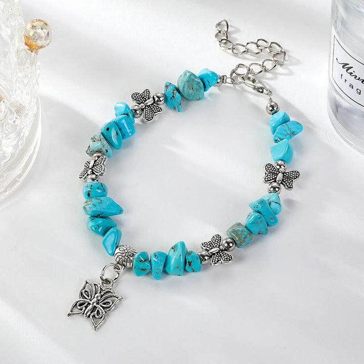 Bracelet à breloques papillon en cristal coloré Olivenorma