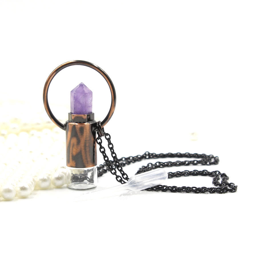 Pendentif bouteille de parfum en cristal naturel prismatique Olivenorma