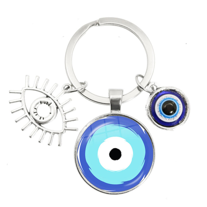 Porte-clés en époxy bleu mauvais œil Hamsa Olivenorma
