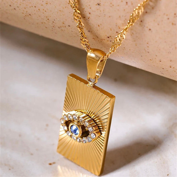 Collier Olivenorma avec topaze bleue et zircon blanc mauvais œil