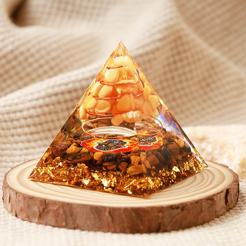 Pierre de soleil Olivenorma avec œil de tigre Pyramide Orgone Hamsa