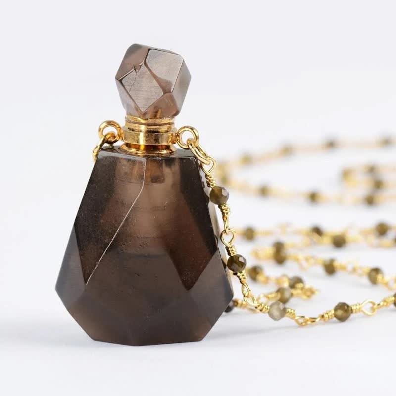 Collier bouteille de parfum en cristal