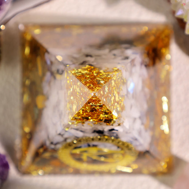 Oeil de tigre Olivenorma Pierre de lune Oeil d'Horus Pyramide orgone