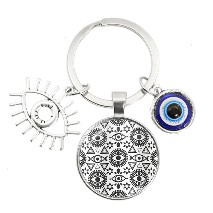 Porte-clés en époxy bleu mauvais œil Hamsa Olivenorma